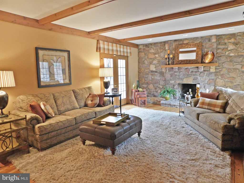 7 Jericho Mountain Road Newtown, PA 18940 - Photo 13 of 39 Sunken Family Room with Fireplace