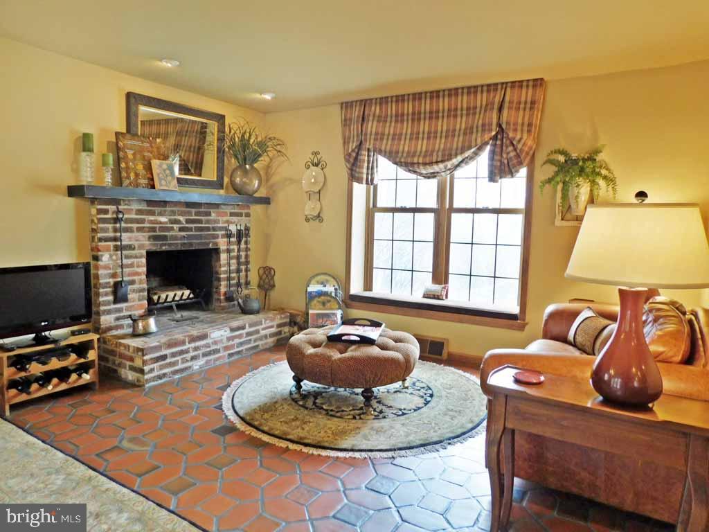 7 Jericho Mountain Road Newtown, PA 18940 - Photo 19 of 39 Den adjacent to the Breakfast Room with Fireplace