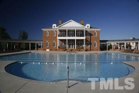 1314 Regulator Street Raleigh, NC 27603 - Photo 21 of 22 a front view of a house with swimming pool