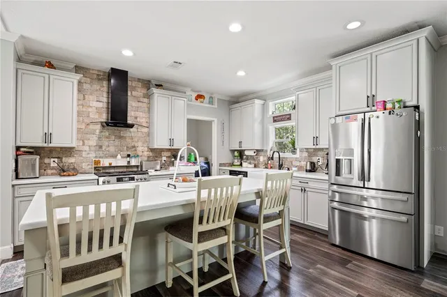 a bathroom with a shower a toilet and a sink