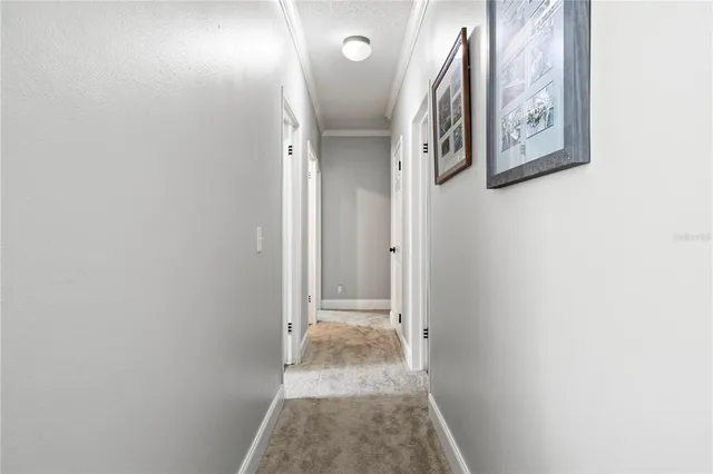 a bedroom with a bed and a bookshelf