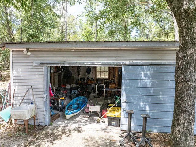 a utility room with sink dryer and washer