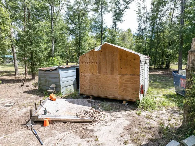 a bathroom with a sink a mirror a bathtub and shower