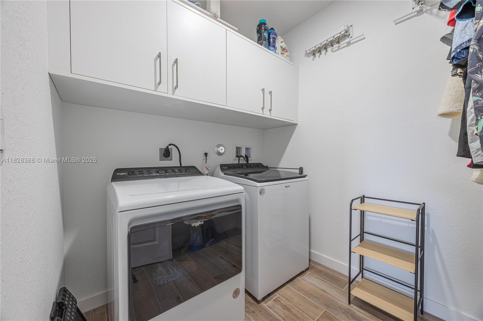 7126 Rockwood Road Jupiter, FL 33458 - Photo 16 of 30 a utility room with dryer and washer