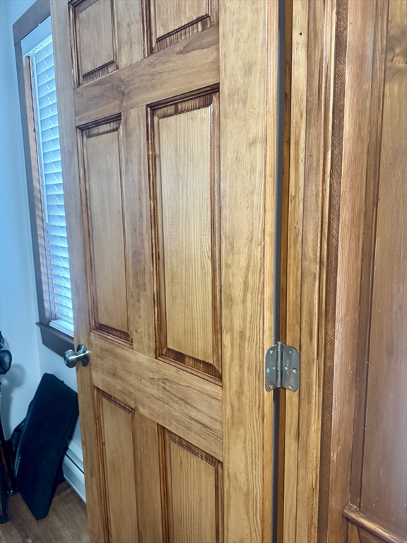 16 Winona Avenue Fairhaven, MA 02719 - Photo 18 of 22 a view of a closet and a chair