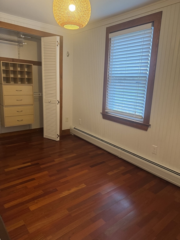 16 Winona Avenue Fairhaven, MA 02719 - Photo 19 of 22 an empty room with wooden floor and windows