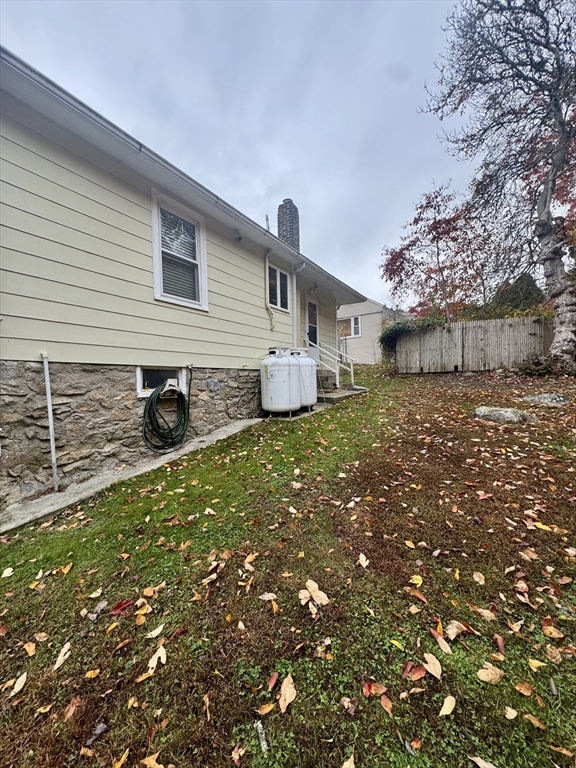 16 Winona Avenue Fairhaven, MA 02719 - Photo 3 of 22 a front view of a house with a yard