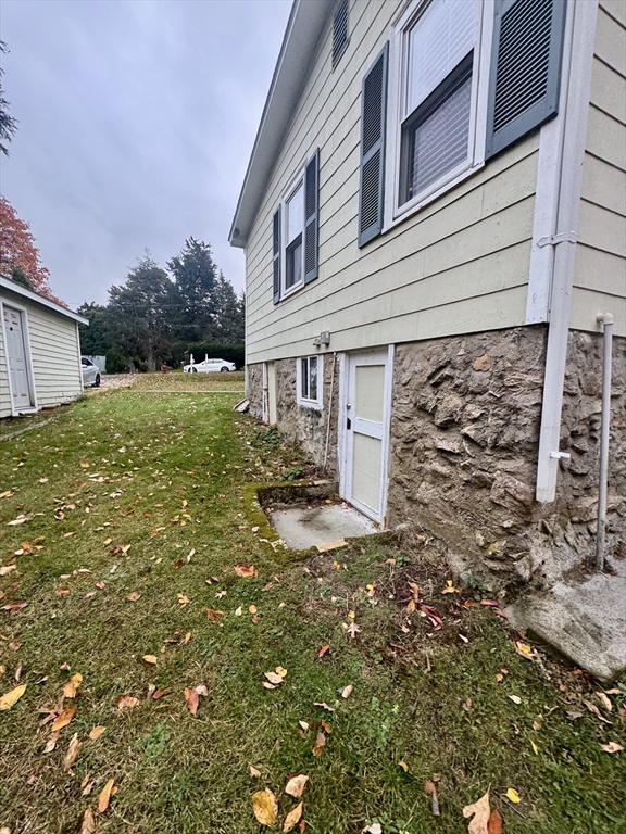 16 Winona Avenue Fairhaven, MA 02719 - Photo 4 of 22 a view of a house with a yard