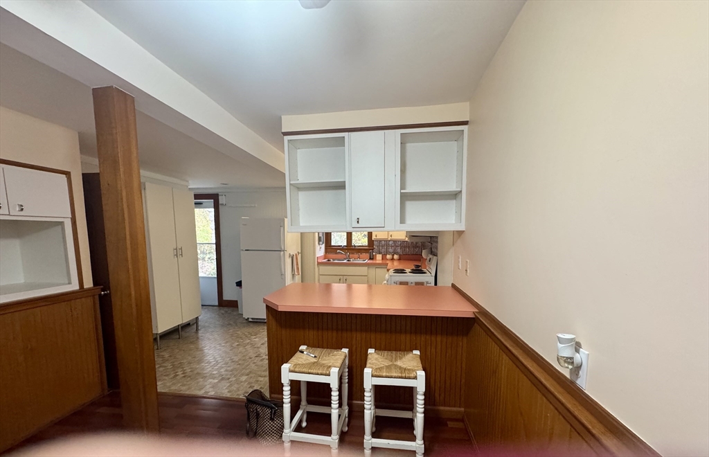 16 Winona Avenue Fairhaven, MA 02719 - Photo 5 of 22 a dining room with furniture and a window