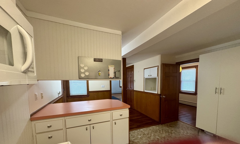 16 Winona Avenue Fairhaven, MA 02719 - Photo 7 of 22 a bedroom with a bed and a dresser