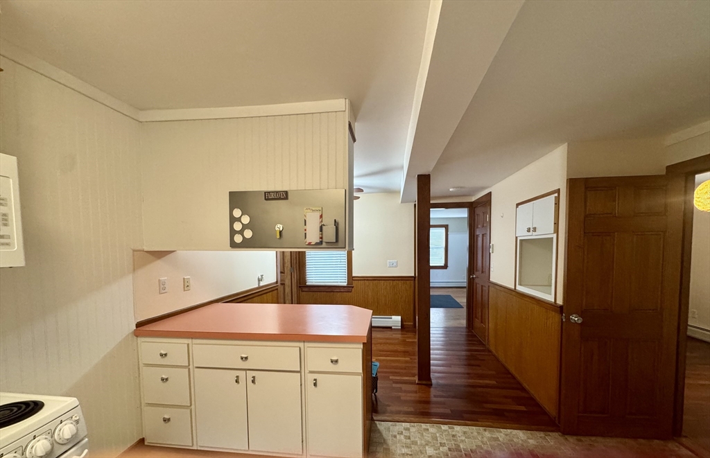 16 Winona Avenue Fairhaven, MA 02719 - Photo 8 of 22 a hallway with wooden floor