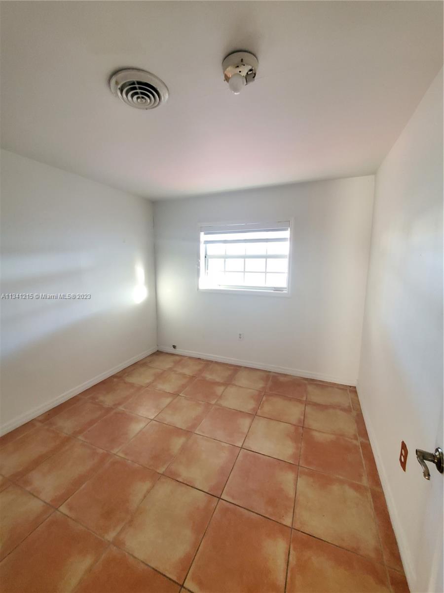 2120 Southwest 84th Avenue Miami, FL 33155 - Photo 8 of 8 a view of an empty room and window