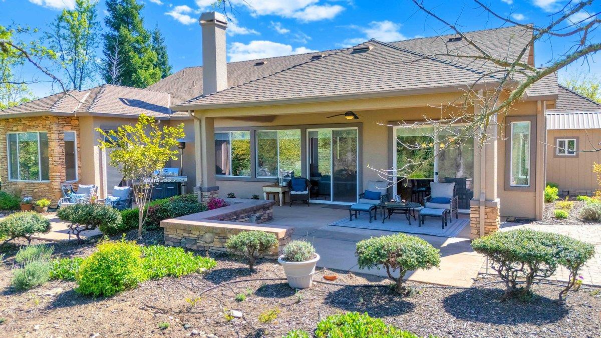 16 Rock Ridge Court, Unit 289 Copperopolis, CA 95228 - Photo 6 of 78 Back Patio area. Rock Benches, Several separate seating areas for entertaining.