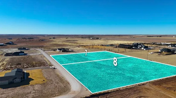 an aerial view of a pool