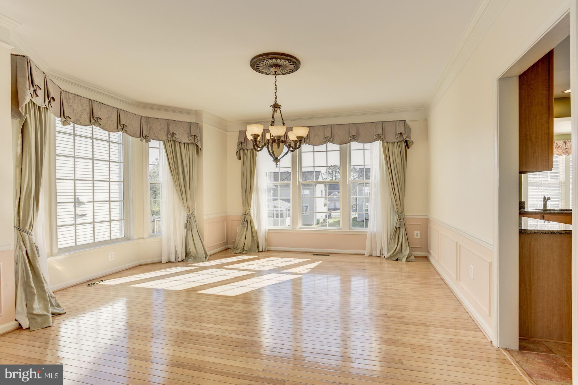 12335 Wake Forest Road Clarksville, MD 21029 - Photo 13 of 60 Formal Dining Room with Lots of Natural Light