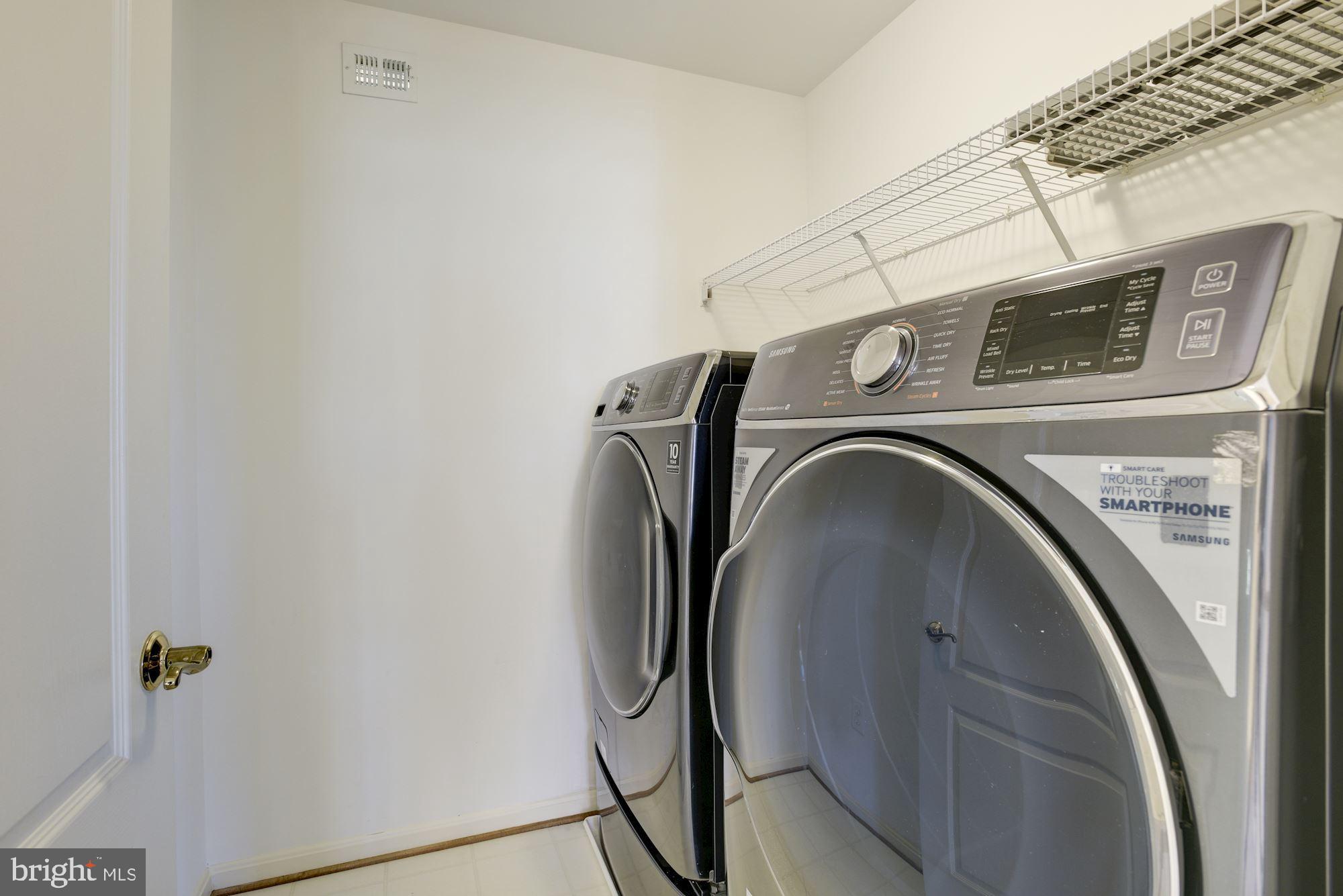 12335 Wake Forest Road Clarksville, MD 21029 - Photo 41 of 60 Upper Level Laundry Room with Front Loading W/D