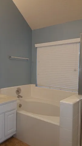 a bathroom with a bathtub