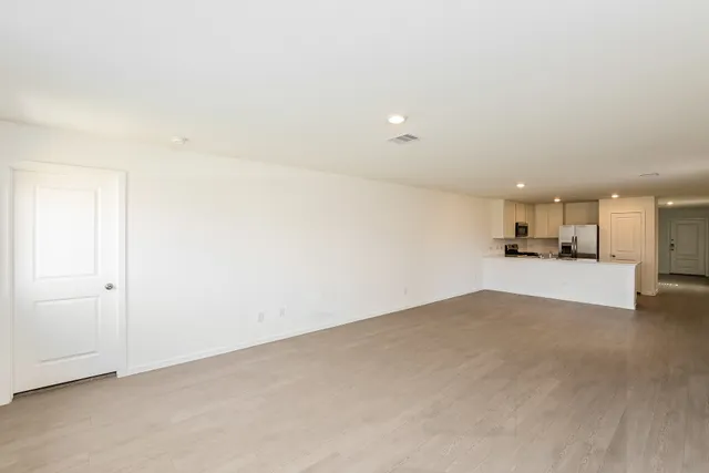 a view of kitchen and kitchen with sink