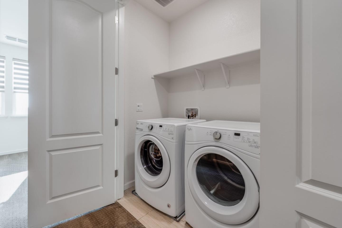 6914 Geyserville Street Dublin, CA 94568 - Photo 22 of 43 a utility room with dryer and washer