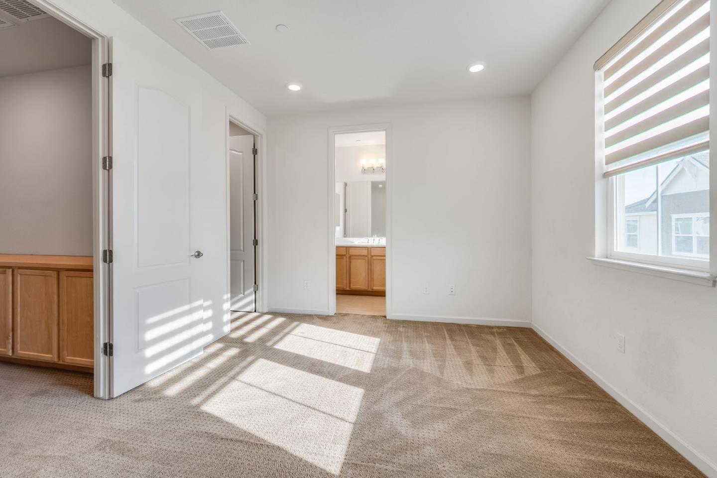 6914 Geyserville Street Dublin, CA 94568 - Photo 25 of 43 a view of a livingroom with an empty space and a window