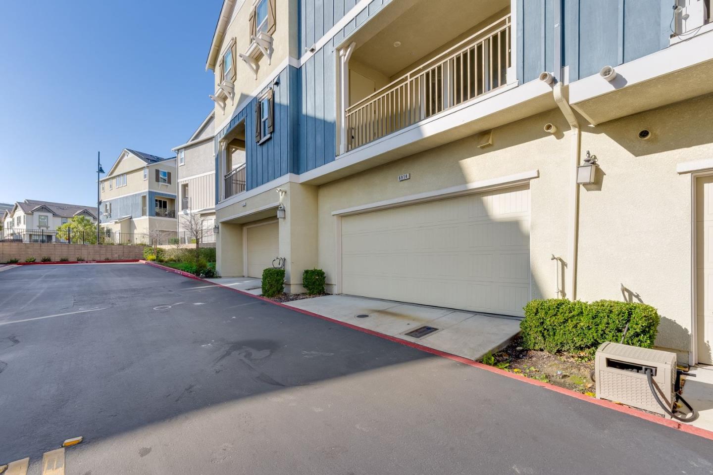 6914 Geyserville Street Dublin, CA 94568 - Photo 29 of 43 a view of a street with a building in the background