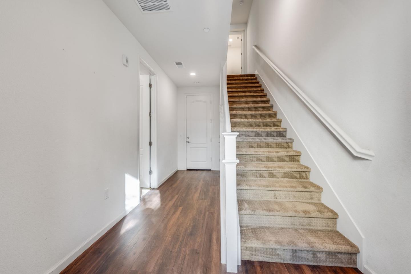 6914 Geyserville Street Dublin, CA 94568 - Photo 3 of 43 a view of entryway and hall with wooden floor