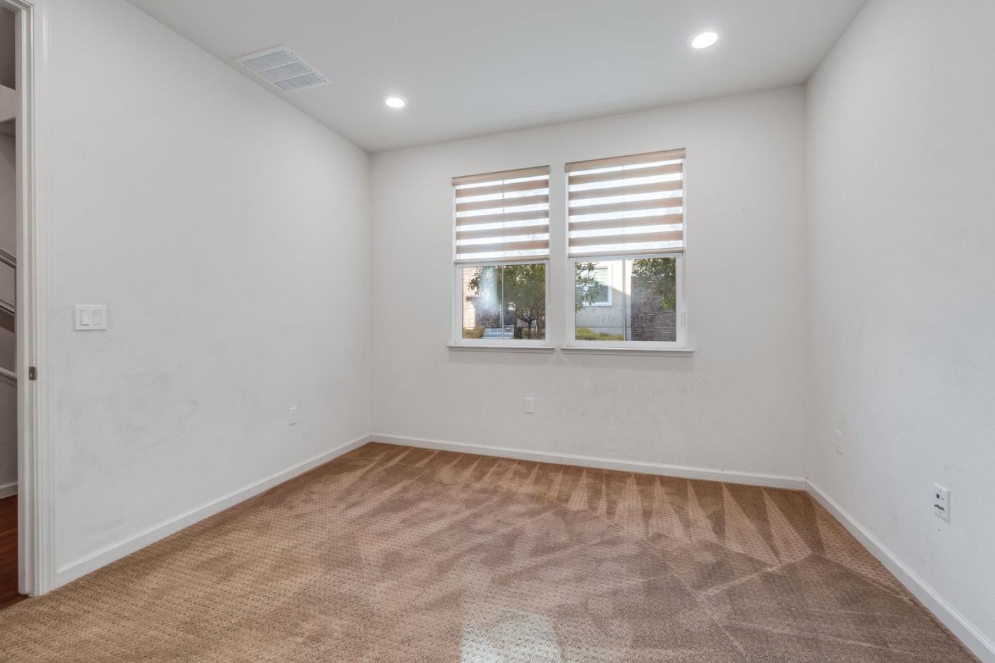 6914 Geyserville Street Dublin, CA 94568 - Photo 7 of 43 an empty room with a window