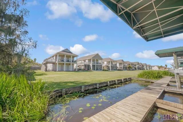 $215,000 | 11182 River Highlands Drive, Unit 10A, St. Amant, LA 70774