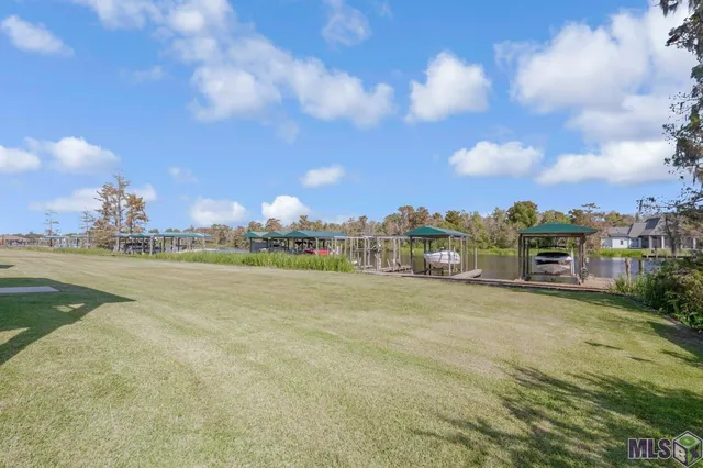 $215,000 | 11182 River Highlands Drive, Unit 10A, St. Amant, LA 70774