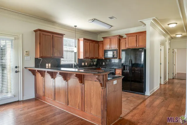 $215,000 | 11182 River Highlands Drive, Unit 10A, St. Amant, LA 70774