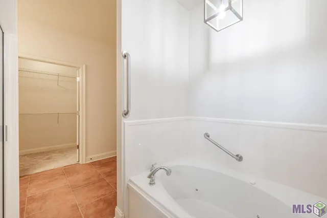 $215,000 | 11182 River Highlands Drive, Unit 10A, St. Amant, LA 70774