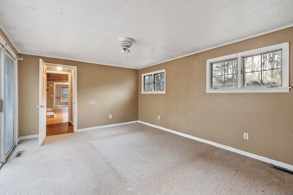 146 Riceville Road Athol, MA 01331 - Photo 19 of 42 a view of an empty room with windows