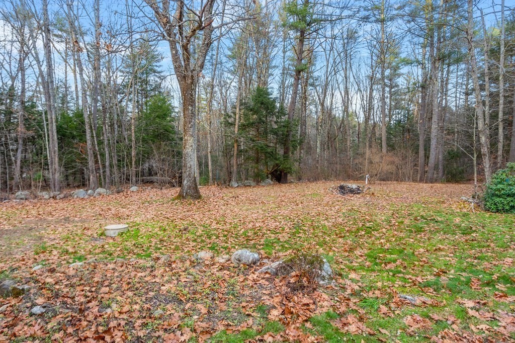 146 Riceville Road Athol, MA 01331 - Photo 31 of 42 a backyard of a house with lots of green space