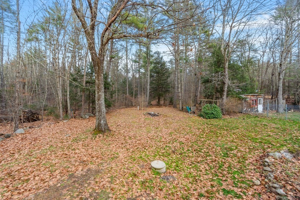 146 Riceville Road Athol, MA 01331 - Photo 36 of 42 a backyard of a house with lots of green space