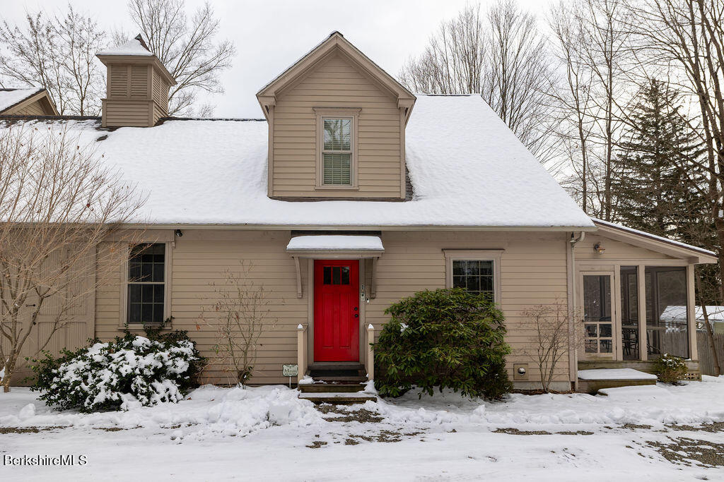 165 D Maple Avenue Great Barrington, MA 01230 - Photo 1 of 32 a front view of a house with garden