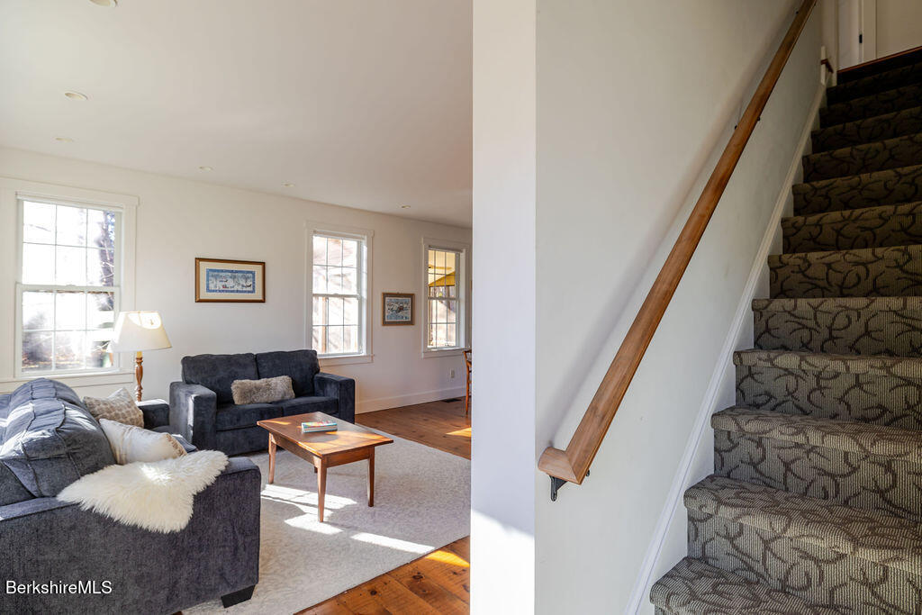 165 D Maple Avenue Great Barrington, MA 01230 - Photo 20 of 32 a living room with furniture and wooden floor