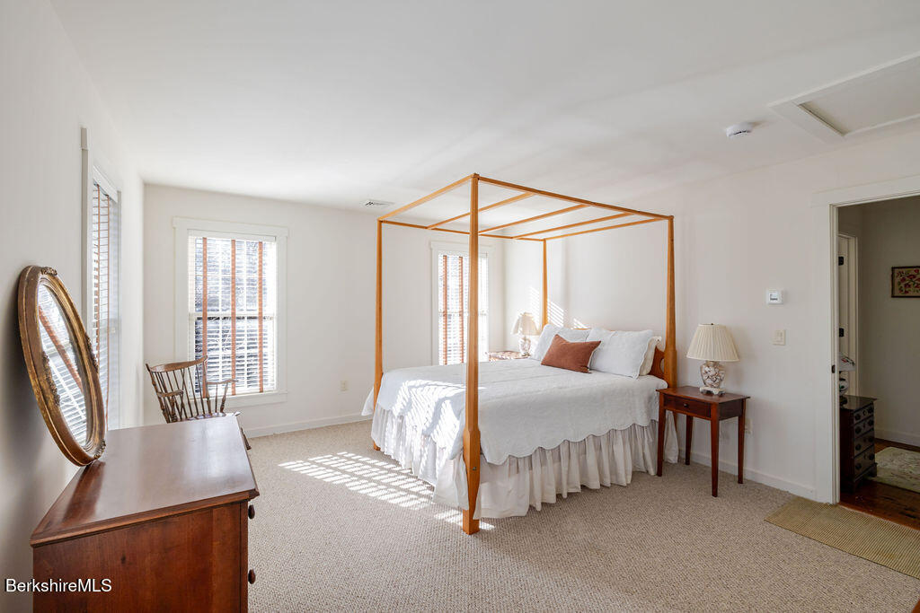 165 D Maple Avenue Great Barrington, MA 01230 - Photo 23 of 32 a bedroom with a bed and a window