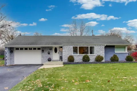 a front view of house with yard