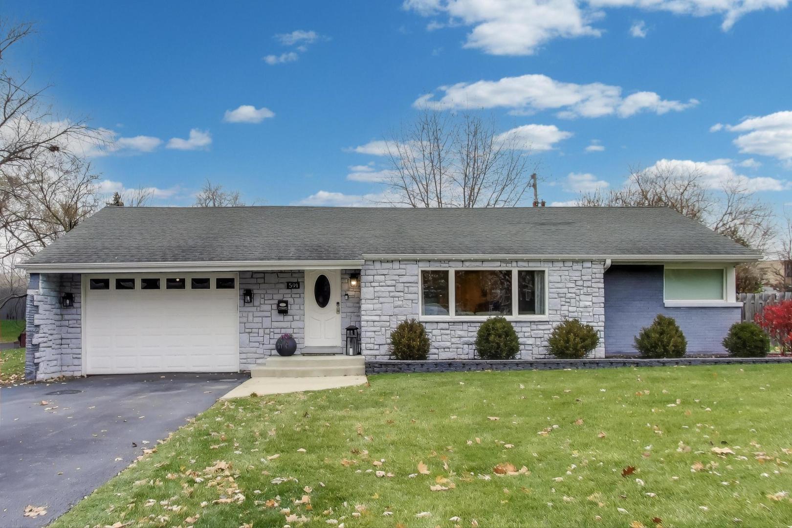 a front view of house with yard