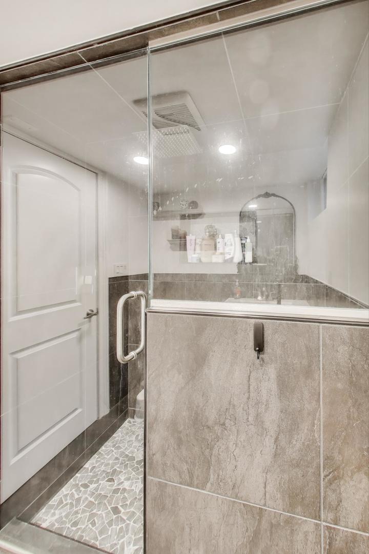 591 South Park Road Lombard, IL 60148 - Photo 21 of 30 a kitchen with kitchen island a counter top space cabinets and stainless steel appliances