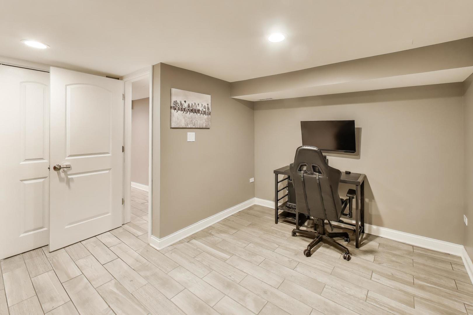 591 South Park Road Lombard, IL 60148 - Photo 23 of 30 a view of workspace with wooden floor windows