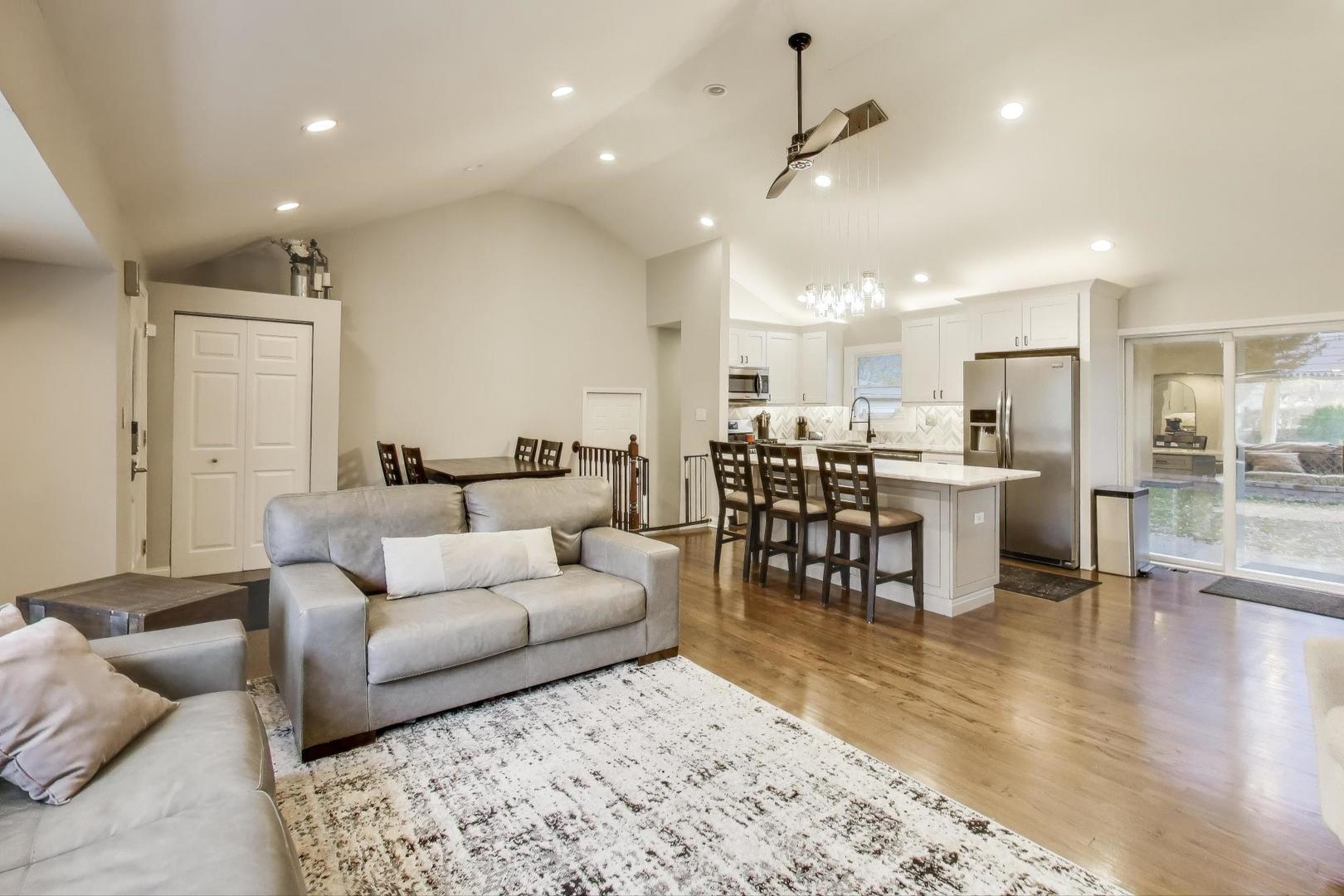 591 South Park Road Lombard, IL 60148 - Photo 4 of 30 a living room with furniture and kitchen view with wooden floor