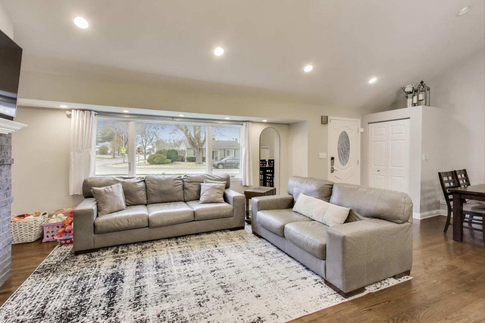 591 South Park Road Lombard, IL 60148 - Photo 5 of 30 a living room with furniture and a large window