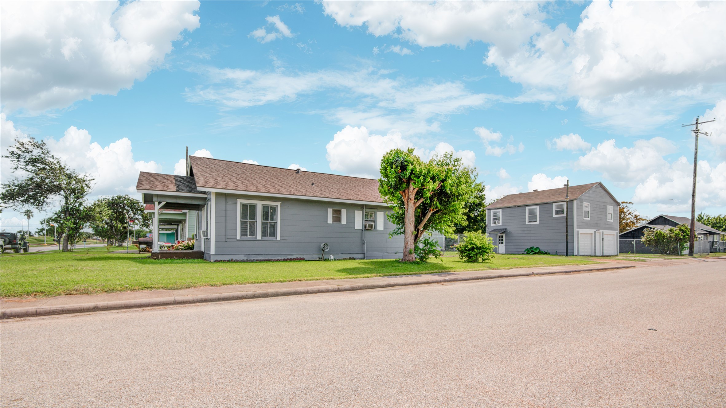 1131 West 2nd Street Freeport, TX 77541 - Photo 16 of 30 a house view with a garden space
