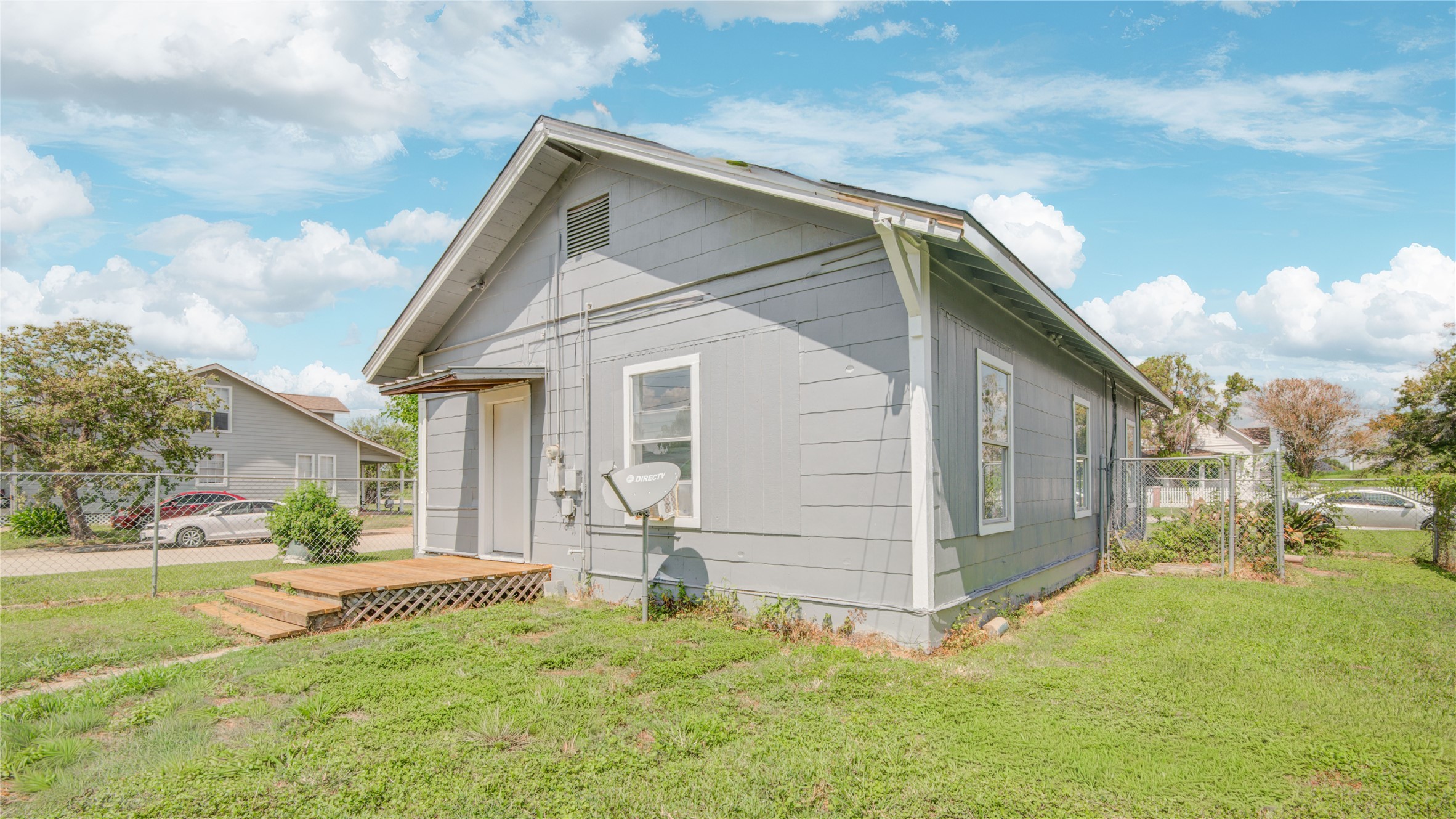 1131 West 2nd Street Freeport, TX 77541 - Photo 17 of 30 a view of a house with a yard