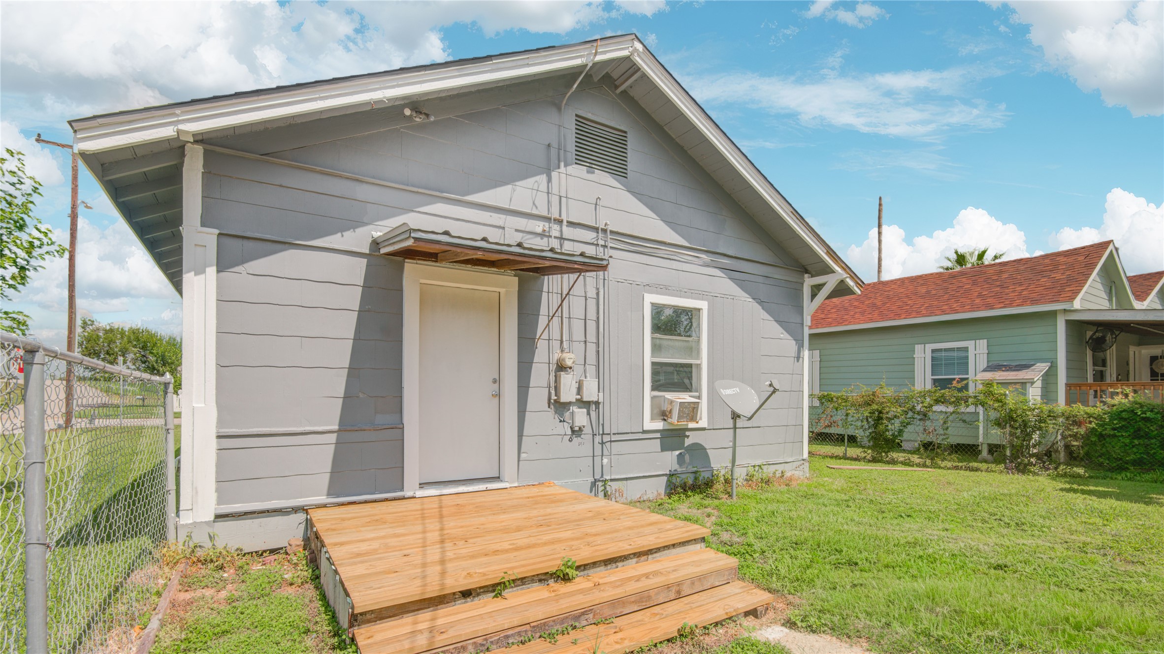 1131 West 2nd Street Freeport, TX 77541 - Photo 3 of 30 a backyard of a house with seating space