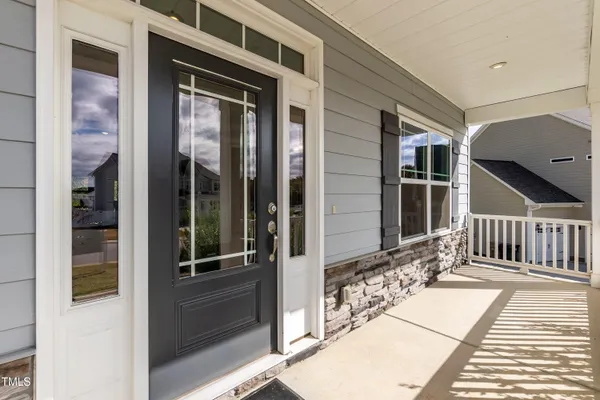 a view of a balcony with door