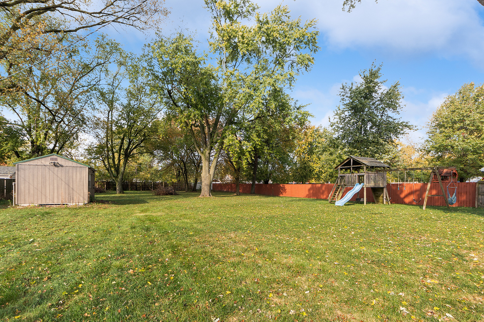 829 South Cedar Road New Lenox, IL 60451 - Photo 20 of 23 a view of a field with large trees