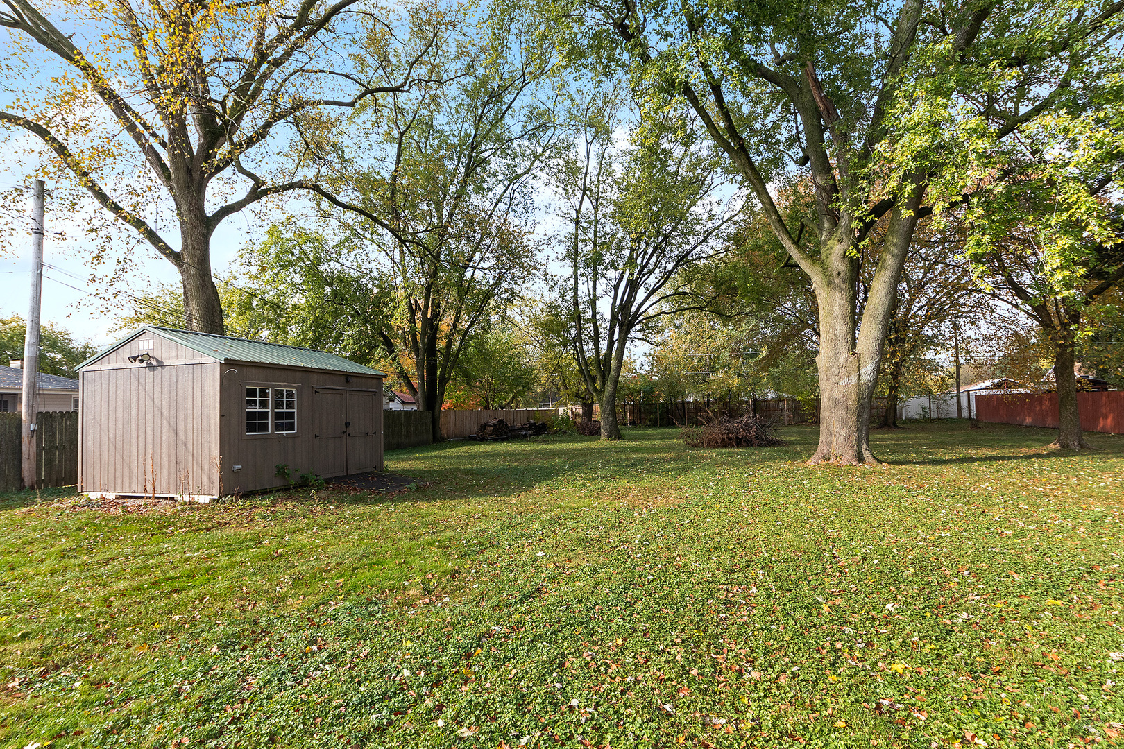 829 South Cedar Road New Lenox, IL 60451 - Photo 22 of 23 a view of a backyard with large trees