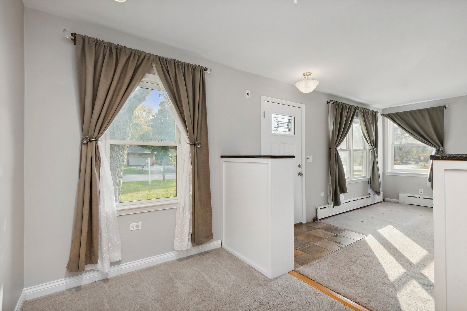 829 South Cedar Road New Lenox, IL 60451 - Photo 6 of 23 a view of a livingroom with furniture and a window
